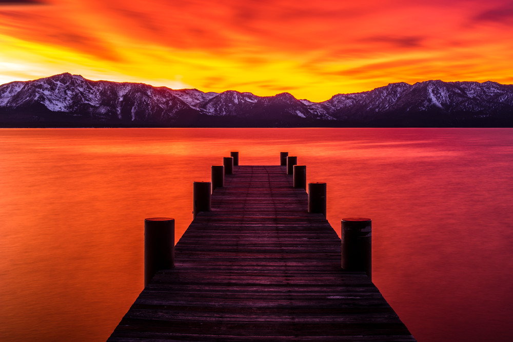The tangerine sunset over Lake Tahoe is an advantage of moving to Nevada
