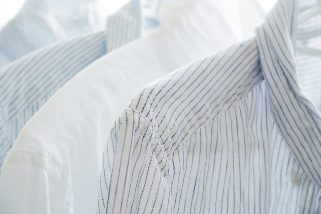 Four white linen shirts