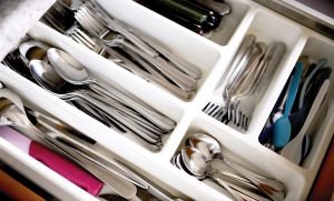 A drawer full of utensils