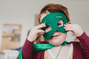 A kid wearing a mask