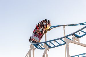 people riding a roller coaster