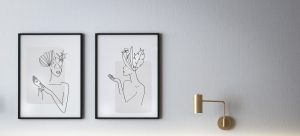 two paintings in black frames on the wall as something to protect when you pack frames and mirrors