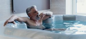 Man sitting in a hot tub