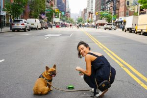 girl and a dog on the street