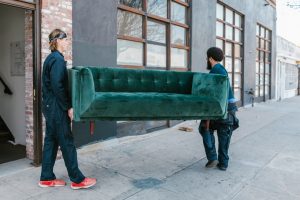 movers carrying sofa 