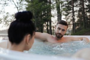 Two people in a hot tub