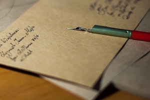 Brown letter envelope and a pen