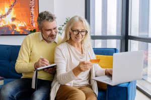 Senior couple in front of the laptop - prepare your LV home for aging in place