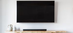 flatscreen tv hanged on the wall