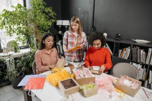 3 women packing for a same day office relocation