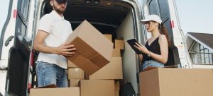 Professional loading truck while talking about how to know if cheap movers are reliable;
