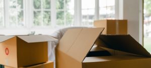 Picture of cardboard boxes representing what you need to know about moving insurance